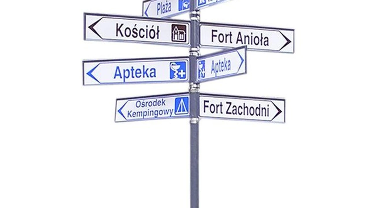 overhead view of corned beef sliced and on a platter with cabbage, potatoes, and carrots