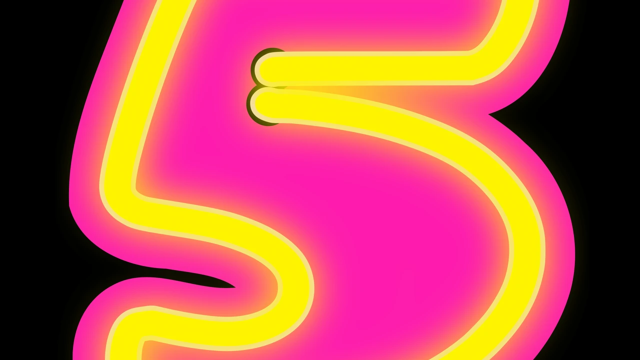 overhead view of corned beef sliced and on a platter with cabbage, potatoes, and carrots