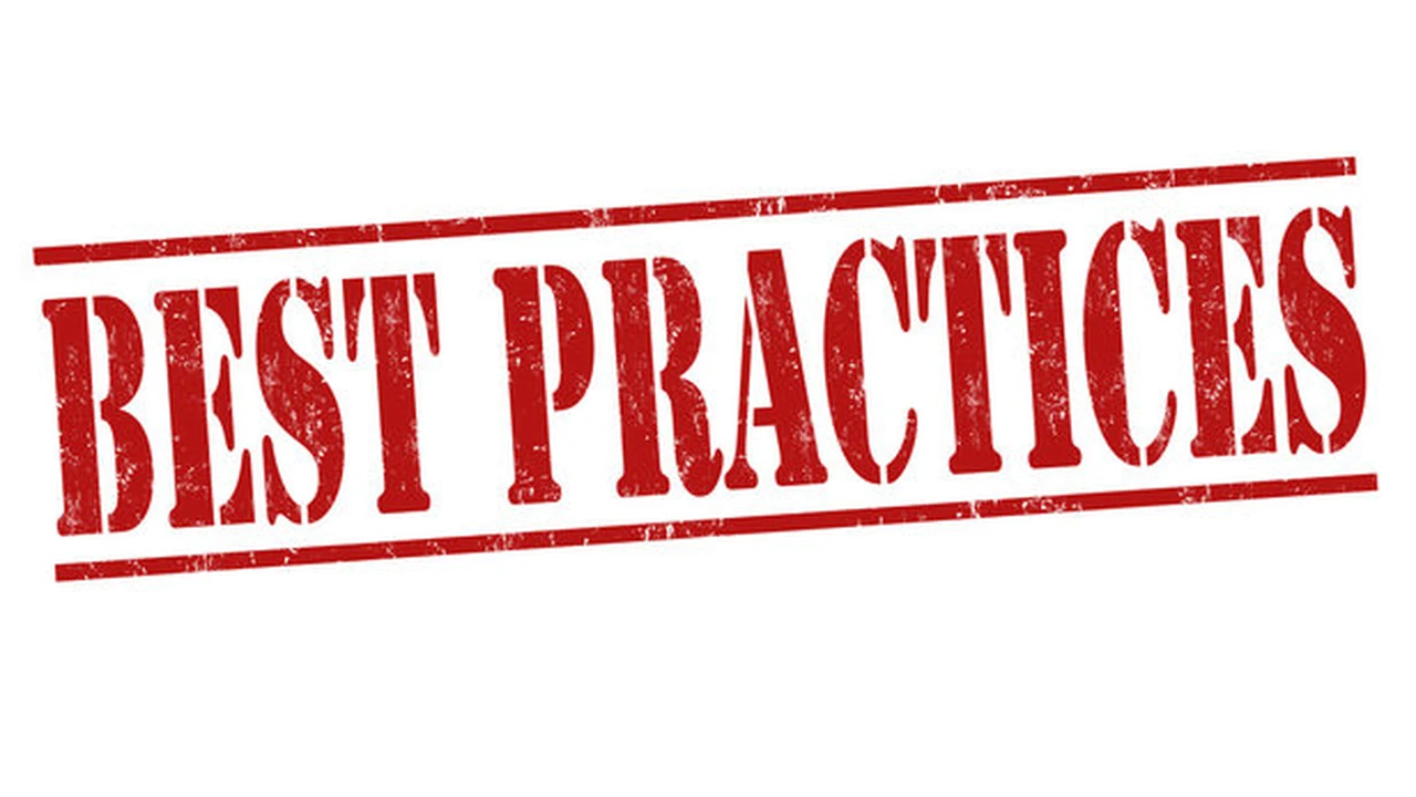 overhead view of corned beef sliced and on a platter with cabbage, potatoes, and carrots