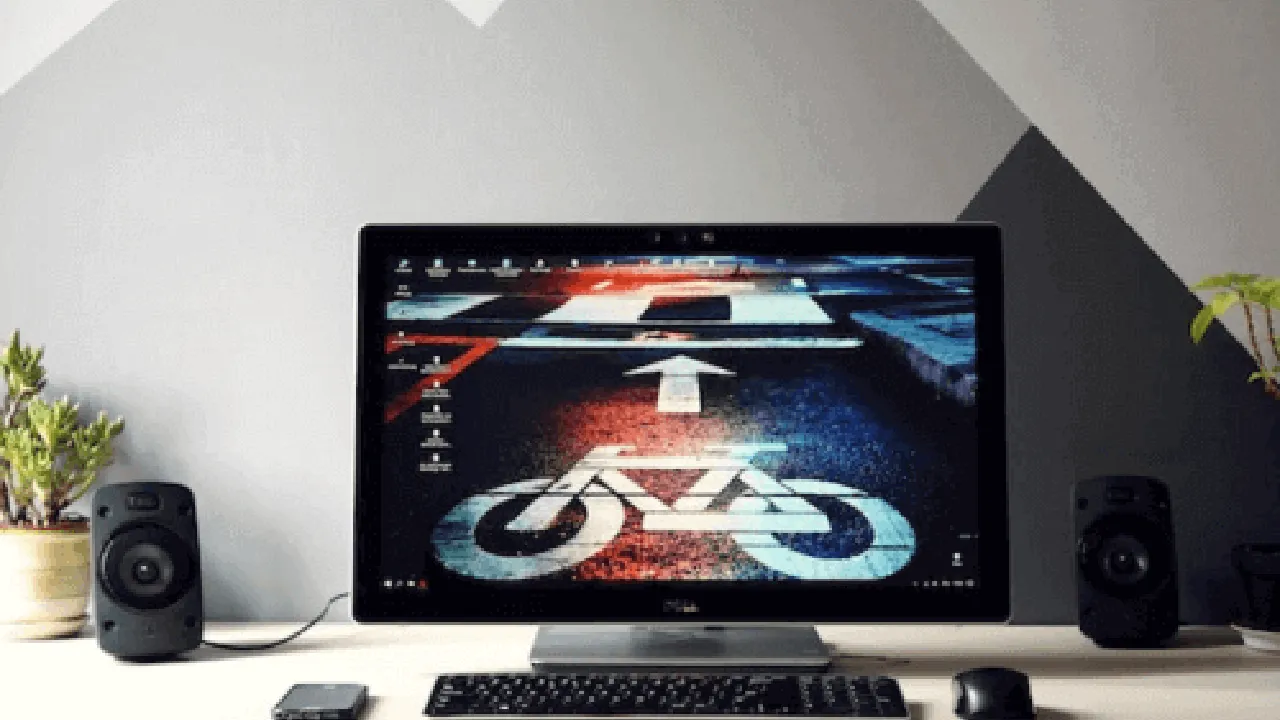 Close up on a plate of mashed potatoes, topped with baked pork chops with cream of mushroom soup, and a side of green beans.